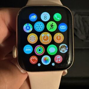 Apple Smartwatch with Gold Case and Cream Band